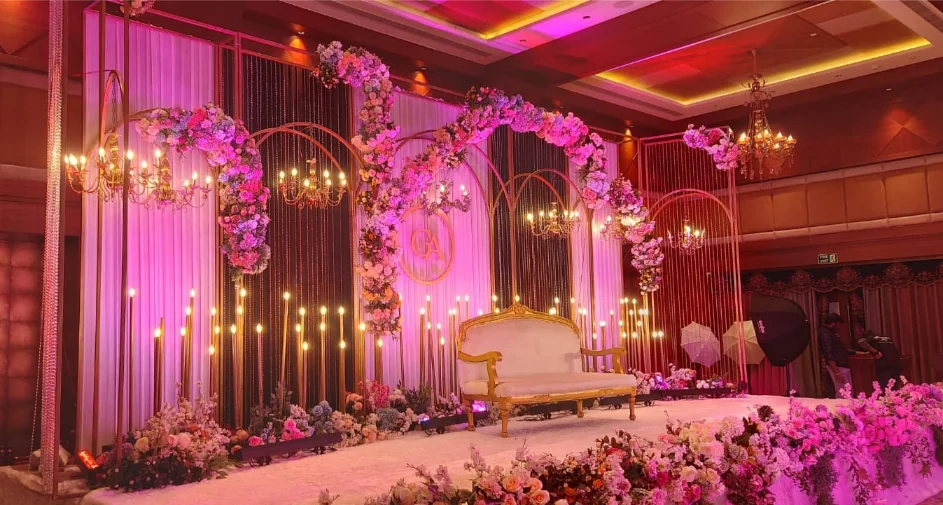 Mehendi setup with colorful floral styling