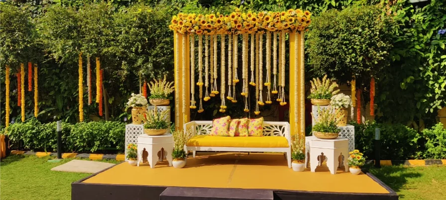 Haldi at home decor setup with flowers
