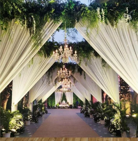 Entrance decor with flowers and warm lights
