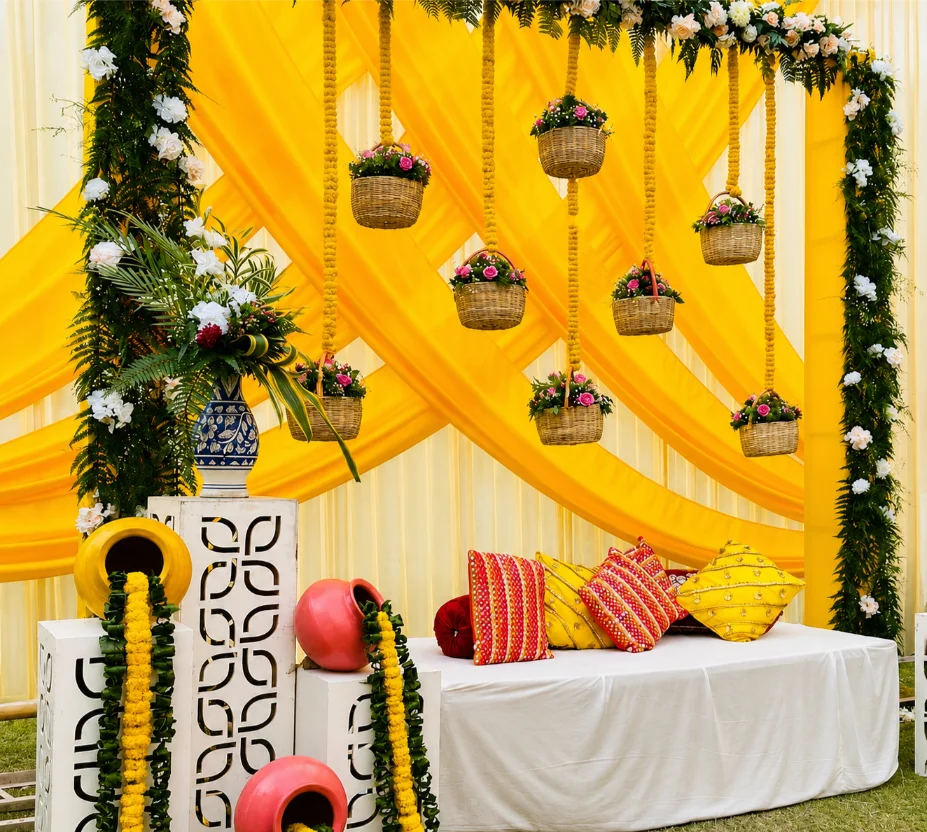 Mehendi decor with colorful lounge and floral styling