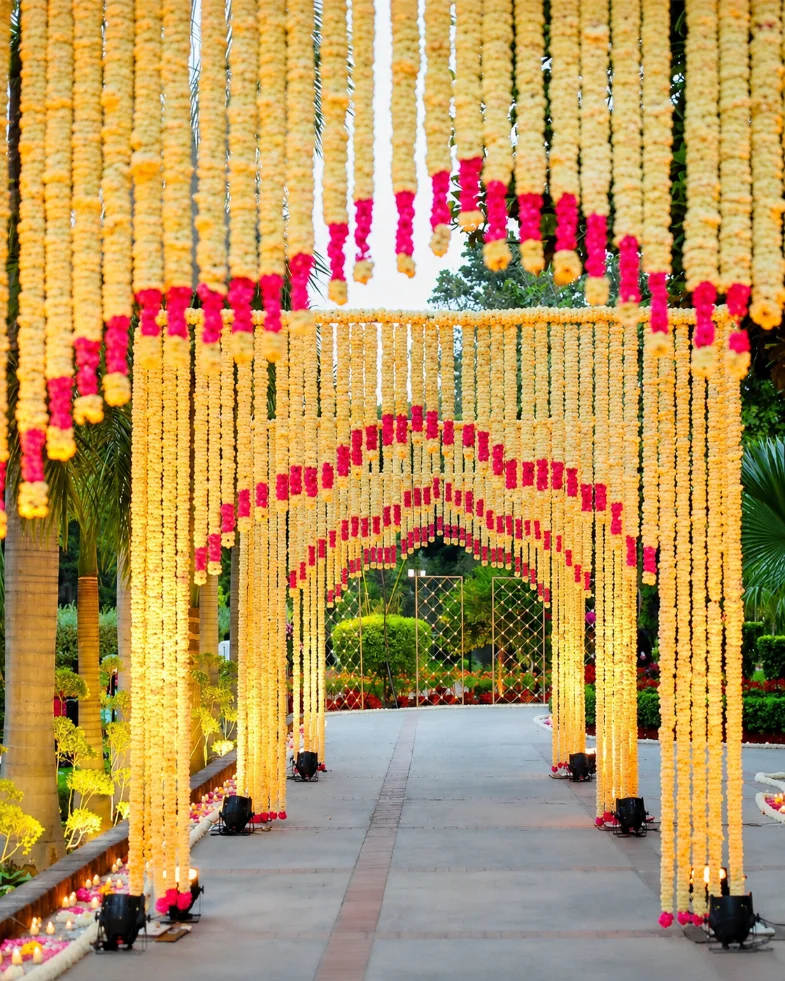 Mehendi decor with colorful lounge and floral styling
