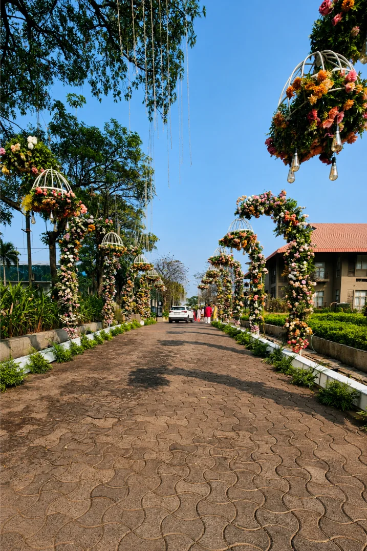 Entrance decor with flowers and warm lights